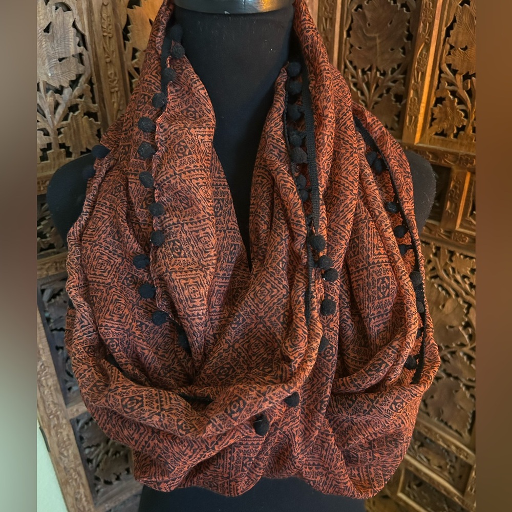Black and Burnt Orange Patterned Scarf with Pom Poms